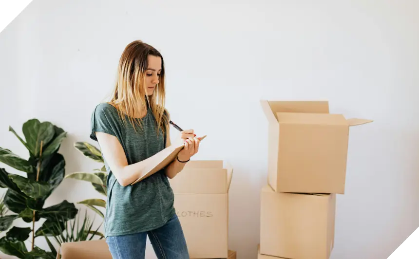 Lady In Room With Boxes CROP